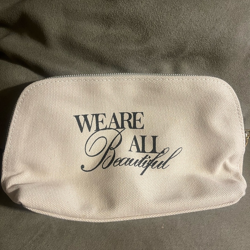 NWOT We Are All Beautiful -Siamo Tutti Belli Cream Pouch